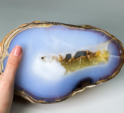 Blue Chalcedony geode with Desert Rose and Hematite inclusions