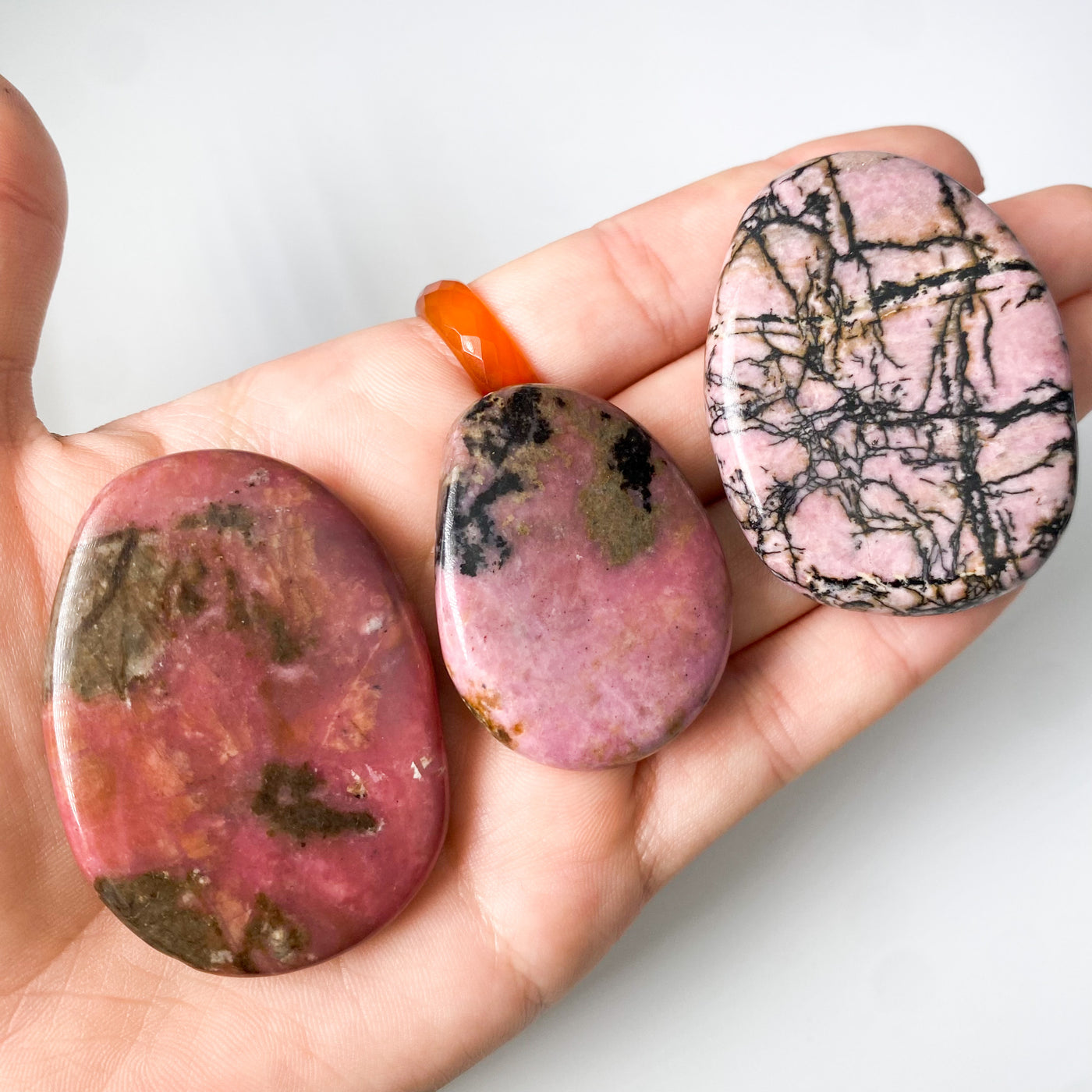 Rhodonite palm stone