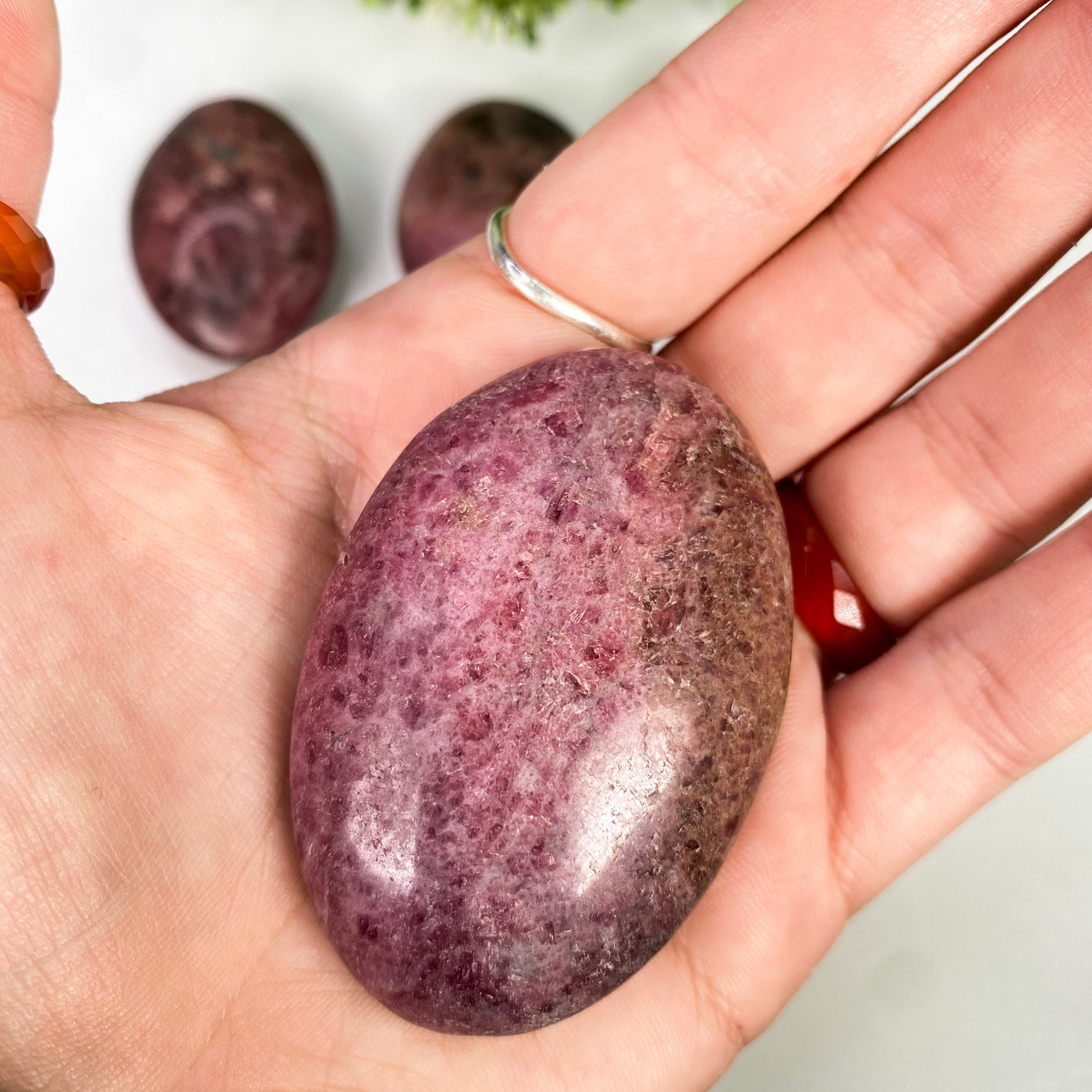 Rhodonite palm stone