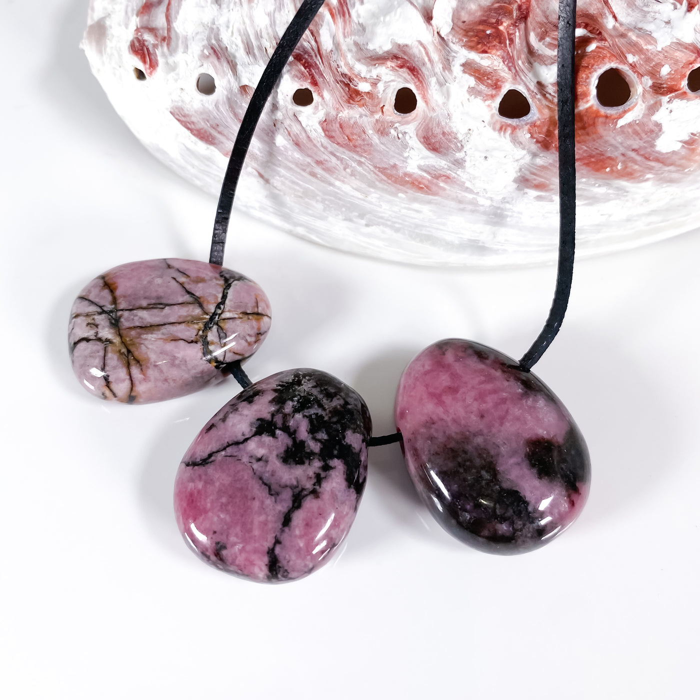 ☯️ Hand-polished Rhodonite Pendant for Harmony