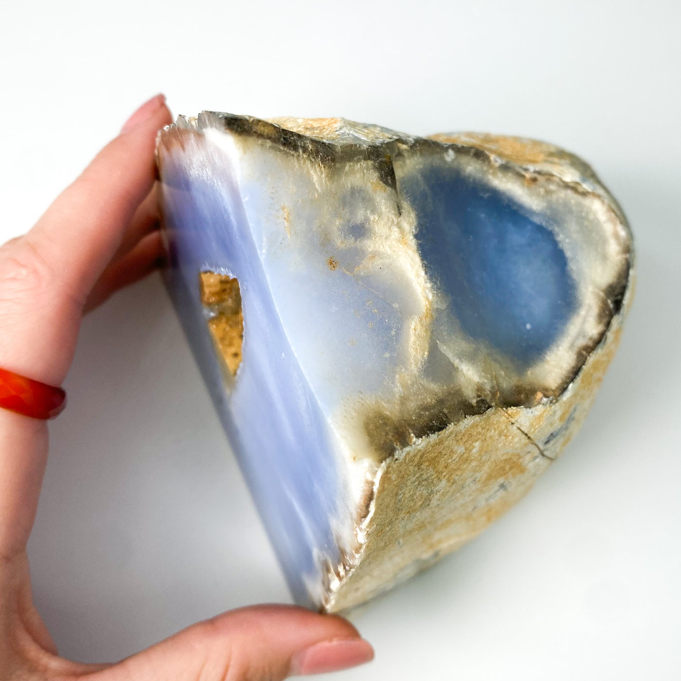 Blue Chalcedony geode with Desert Rose formation