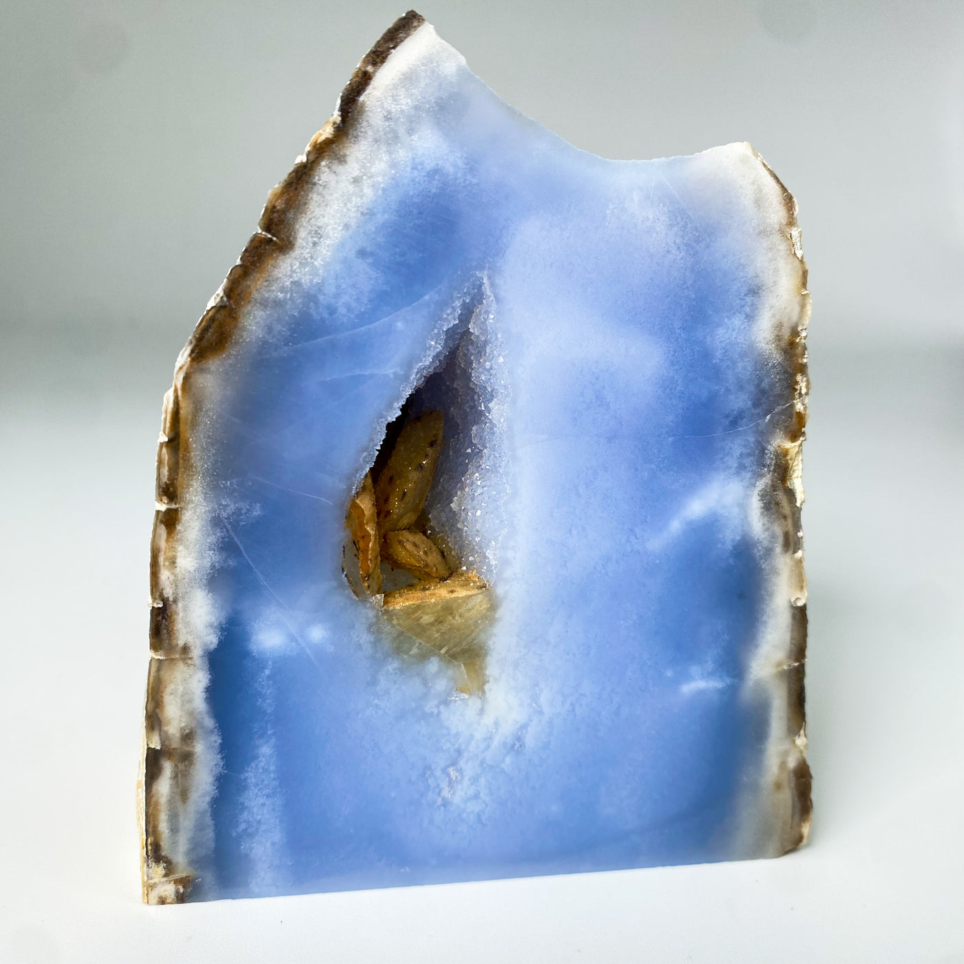 Blue Chalcedony geode with Desert Rose formation