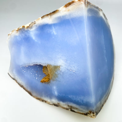 Blue Chalcedony geode with Desert Rose formation